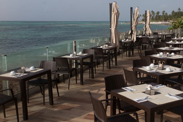 nicely set dinner table at a seaside restaurant