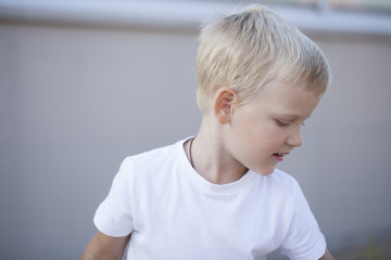 Portrait of a young blonde boy