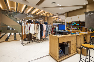 fashionable clothes in modern shopping mall