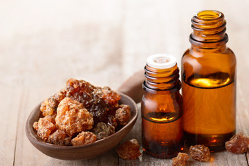 myrrh essential oil on the wooden board