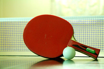 Two Red Table Tennis Rackets