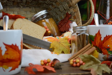 Autumn food set with tea, cup bread, and jelly