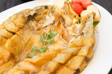 Deep fried fish with fish sauce.