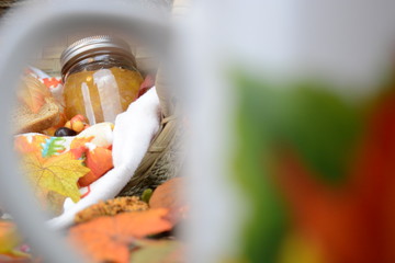 Obraz na płótnie Canvas Autumn food set with tea, cup bread, and jelly