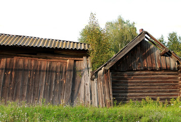old wooden house without windows in russia in the summer