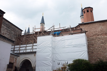 Renovation of part of historic Topkapi Palace wrapped in plastic and scaffolding