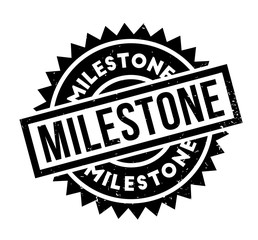 Milestone rubber stamp. Grunge design with dust scratches. Effects can be easily removed for a clean, crisp look. Color is easily changed.