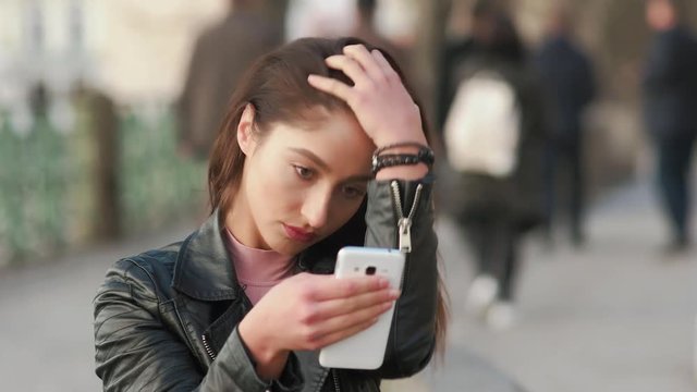 Woman Fixing Her Hair