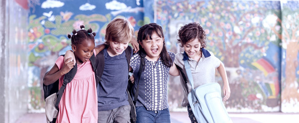 Multi ethnic group of children playing together. Success and integration concept