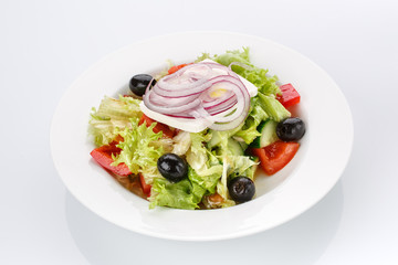 Restaurant food. Salad with bread in a plate. Delicious food.