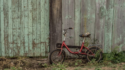 Fototapeta na wymiar old children's bicycle