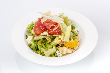 Restaurant food. Salad in a plate. Delicious food.