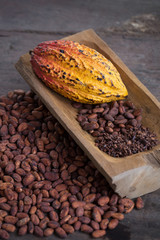 Cacao fruit, raw cacao beans, Cocoa pod on wooden background