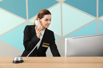 Female receptionist working in hotel