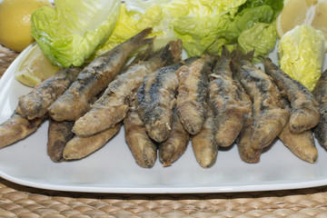 Boquerones fried, fried anchovies typical in Spain
