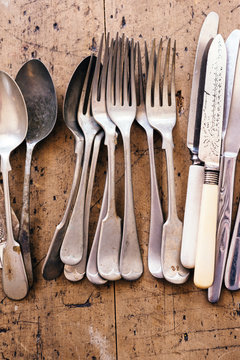 vintage cutlery on a wooden table