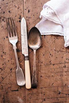 vintage cutlery on a wooden table