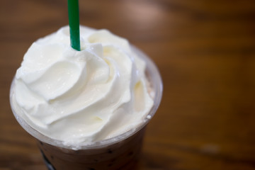 Whipped cream top on iced coffee