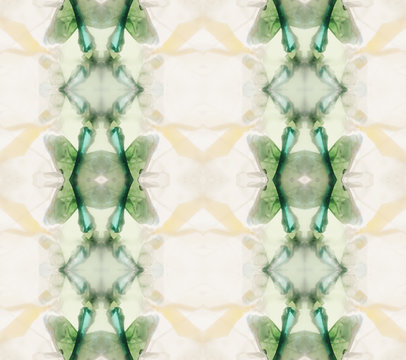 Green geometrical drawing made by glasses inside kaleidoscope