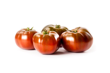 black tomatoes from Crimea isolated on white background