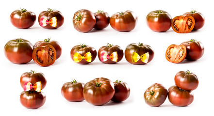 composite with black tomatoes from Crimea isolated on white background