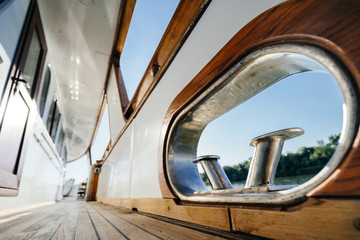 Fairlead and the mooring bollard element on the deck of a luxury wooden yachts.