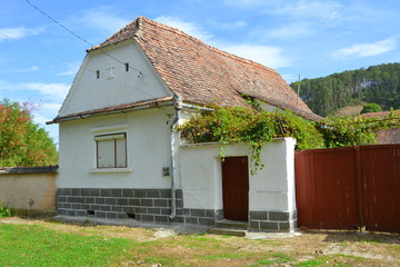 Typical rural landscape and peasant houses in Bradeni, Henndorf, Hegendorf,  Transylvania, Romania....