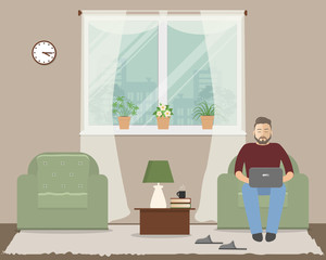 Living room in a beige color. In the armchair is a young man with a laptop. There is a two green armchairs, a window, a table, a lamp, slippers and other objects in the picture. Vector illustration