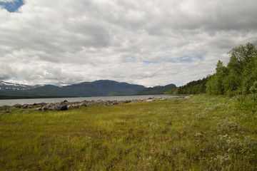 Fototapeta na wymiar Stora Sjöfallet National Park, Stora Lulevatten, mountain Lulep Gierkav, summer 