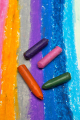 Photo of colorful oil pastels drawing texture for background. Selective focus.