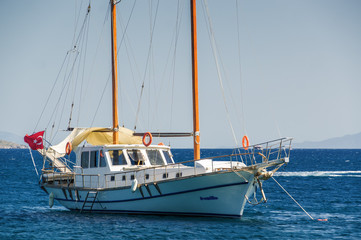 Sunny view of boats at Ortakent near Bodrum, Mugla, Turkey.