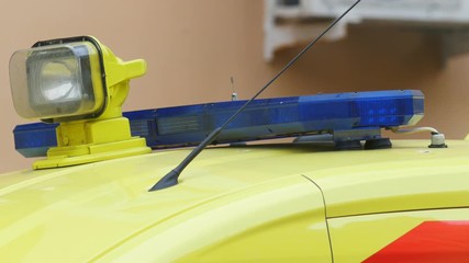 Head flashing light strobe on emergency ambulance car