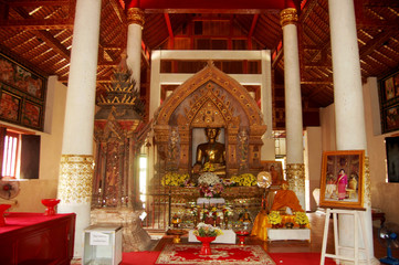 Golden buddha statue of Wat Phaya Wat temple for people visit and pray