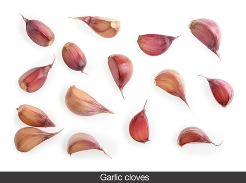 Garlic cloves isolated on white background Top view