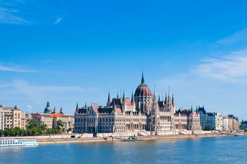Obraz premium Hungarian Parliament on the embankment of Danube river in Budapest, Hungary
