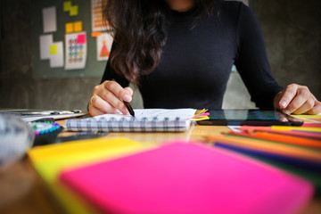 Fototapeta premium stylish designer tailor working at a home studio
