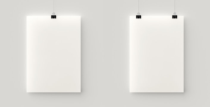 Set of 2 blank posters hanging on a thread with black clips