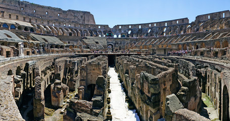 Rome, Lazio, Italy. July 25, 2017: Interior views of the Roman Coliseum with many people visiting the interior
