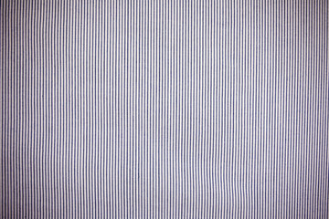 Striped background on the piece of fabric.