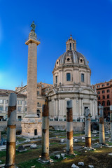 Obraz premium Vertical view of the ruins of the Trajan's Forum and the Catholic Church called 