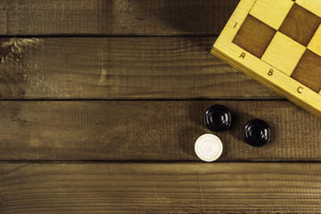 Various board games chess board, playing cards, dominoes. Hobby. Metaphor for games and gambling.