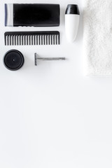 Men's shaving. Tools and cosmetics on white background top view copyspace