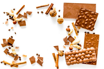 Mockup with chocolate on white background top view