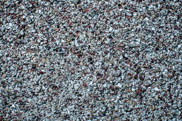 Light gray gravel floor texture, top view.