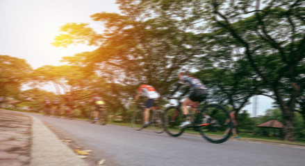 Blurred Speed Cycling Recreation in The Park - Sport and Lifestyle Concept