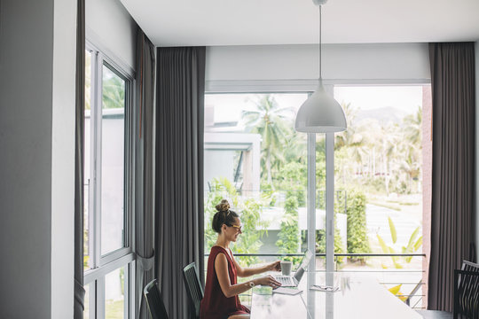 Woman Working on Her Laptop at Home