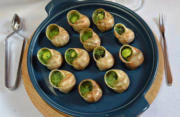 grape snails baked with butter and spices © nikitos77
