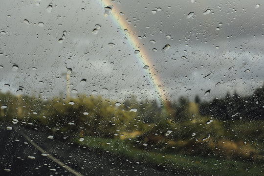 Rain Droplets on Windshield with Rainbow