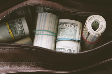 leather bag with cash