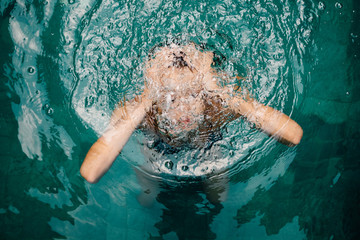 Tanned Caucasian Woman Underwater